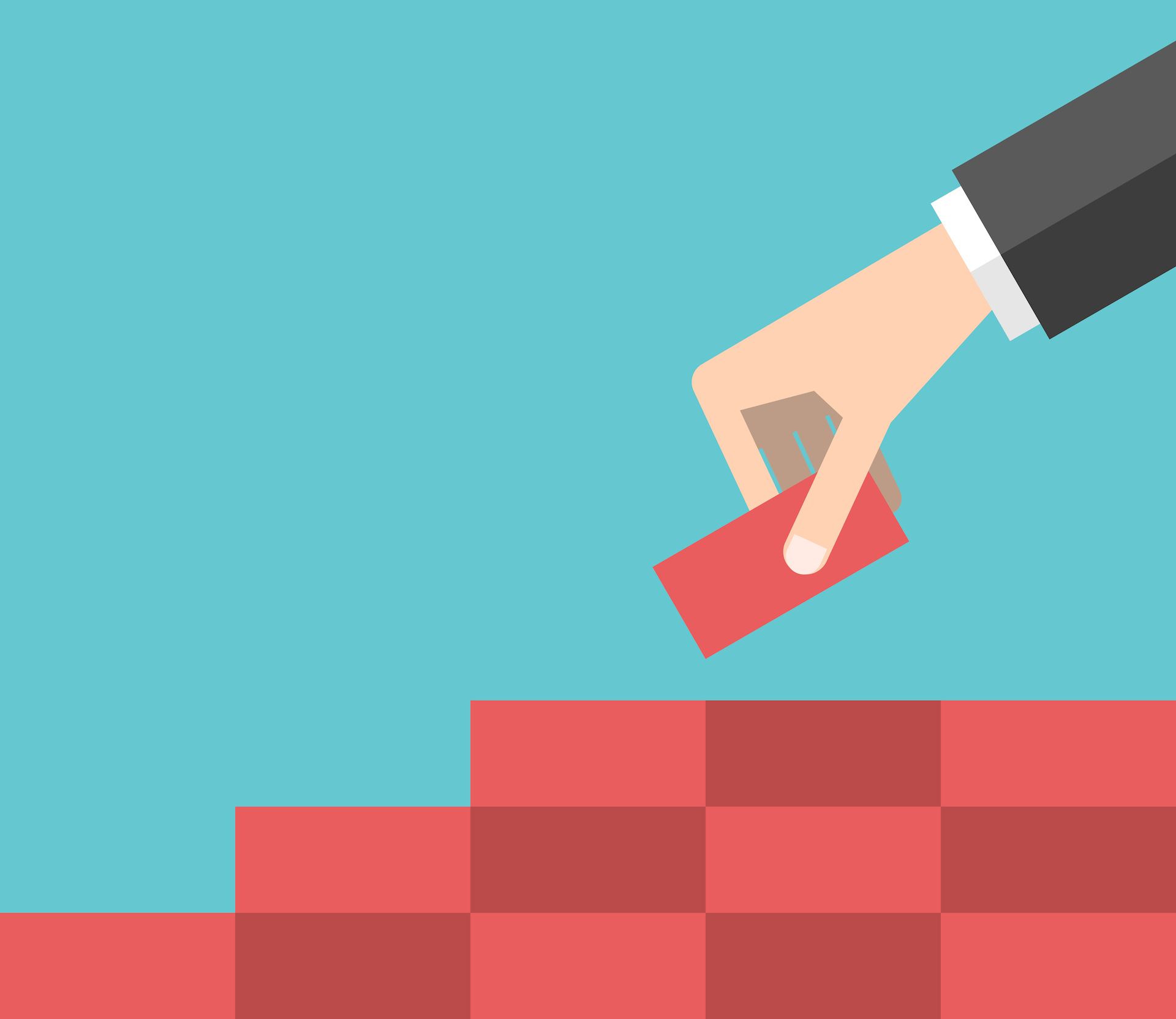 Hand placing building blocks