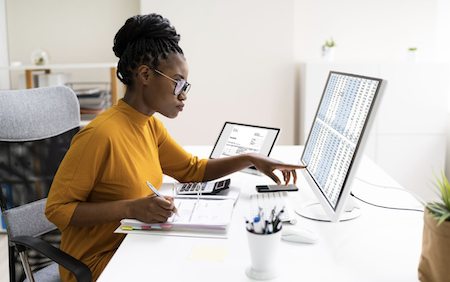 woman looking at computer screen
